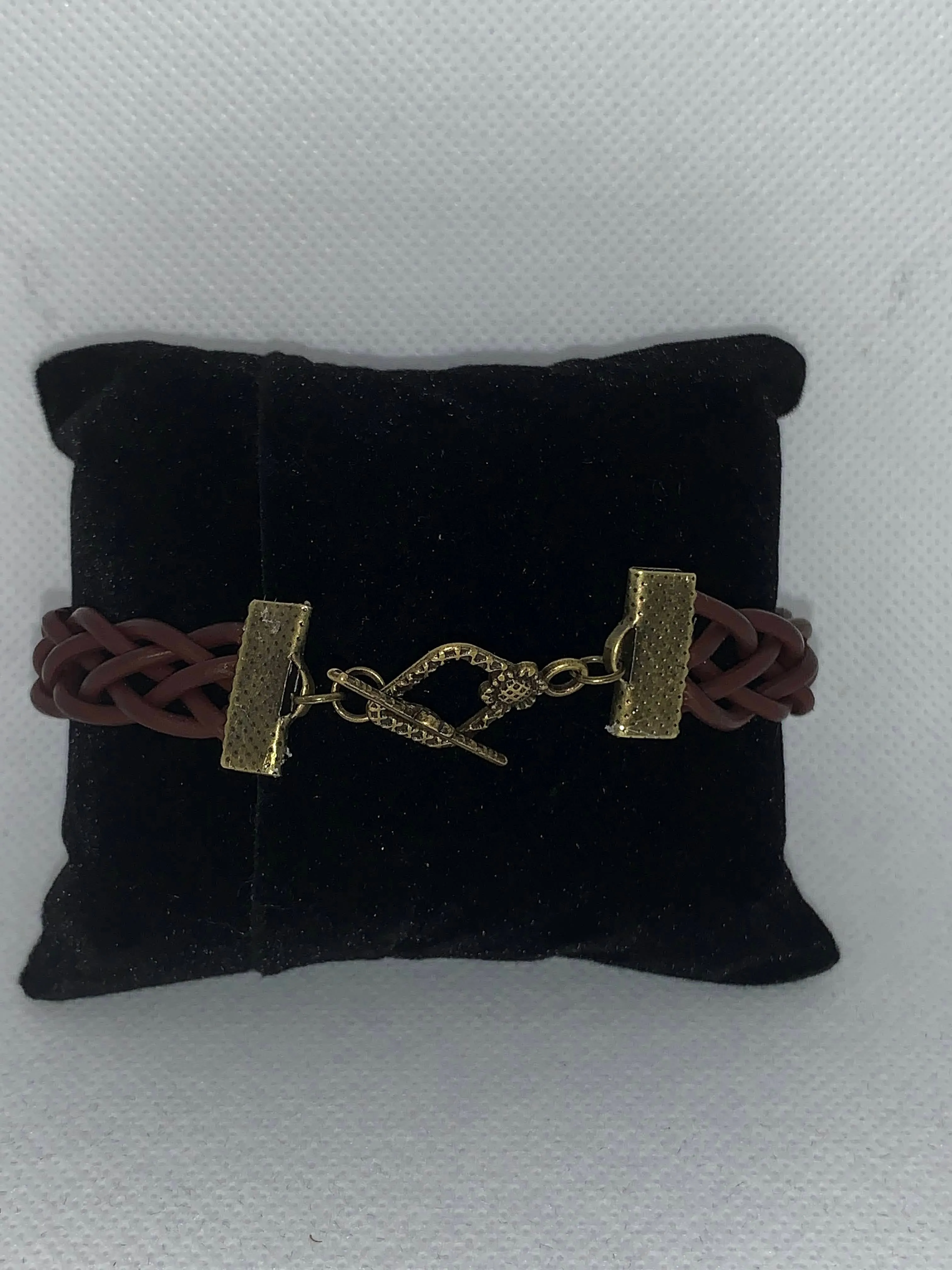 Brown braided and gold leather bracelet