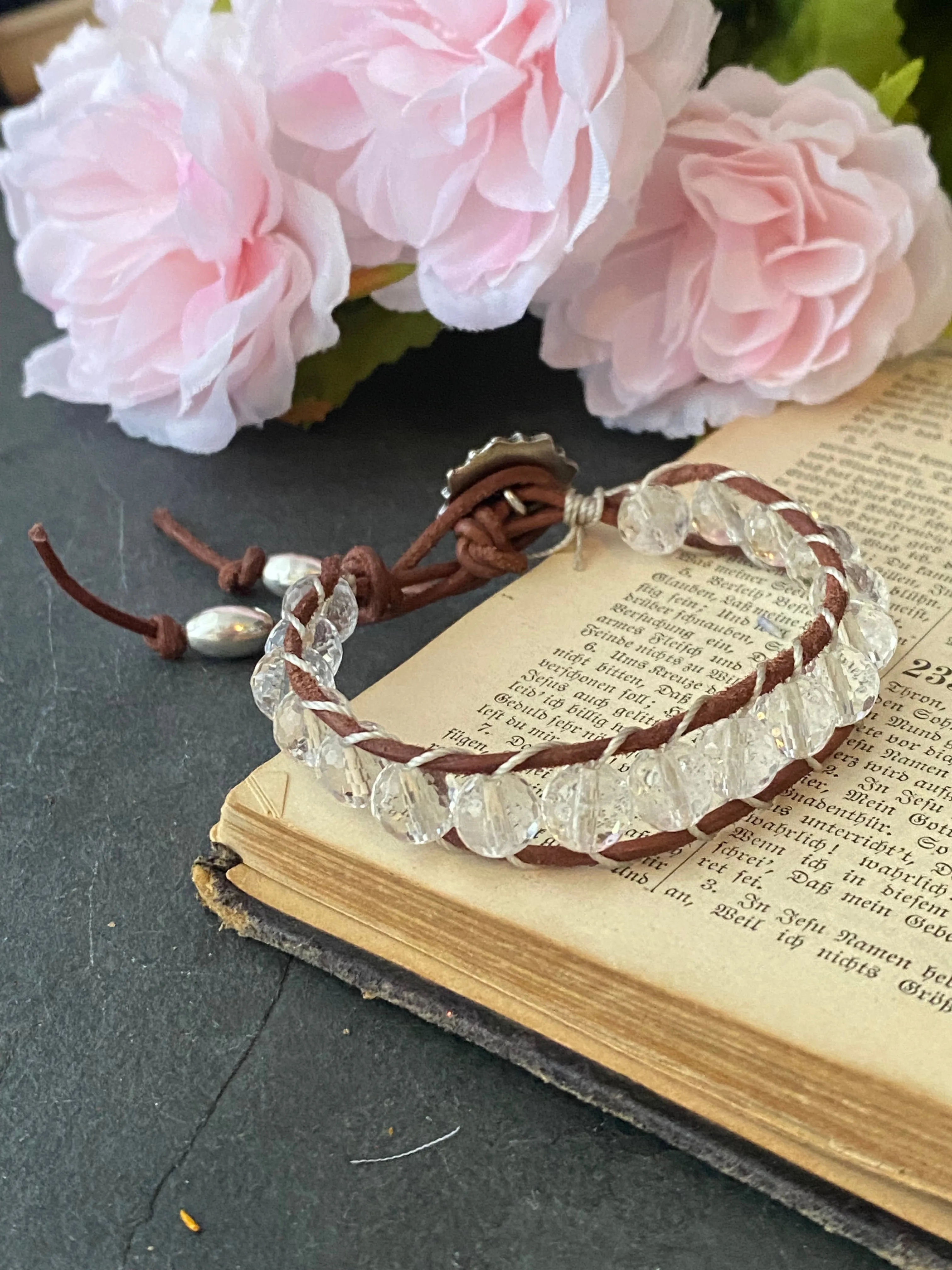 Faceted clear quartz stone, leather ladder bracelet with silver button