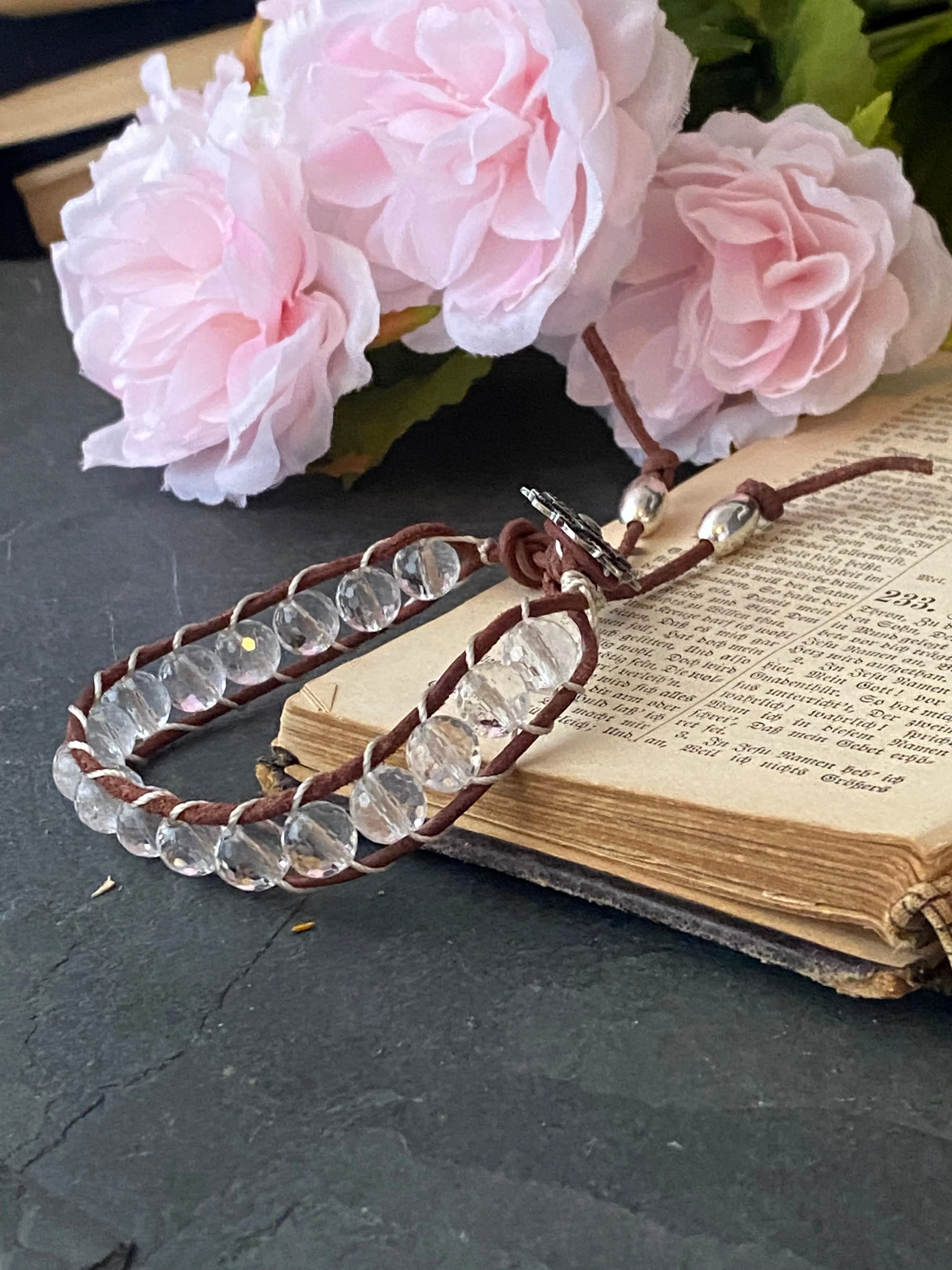 Faceted clear quartz stone, leather ladder bracelet with silver button