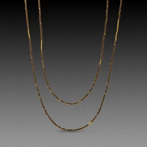 Long Pyrite Necklace with Gold Beads